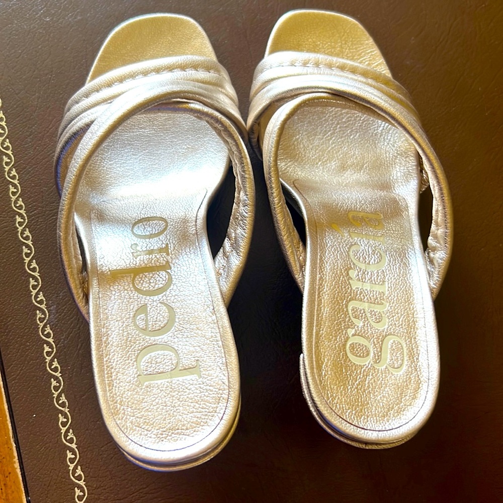 Brand new gold sandals.  Comes with dust bag and box!